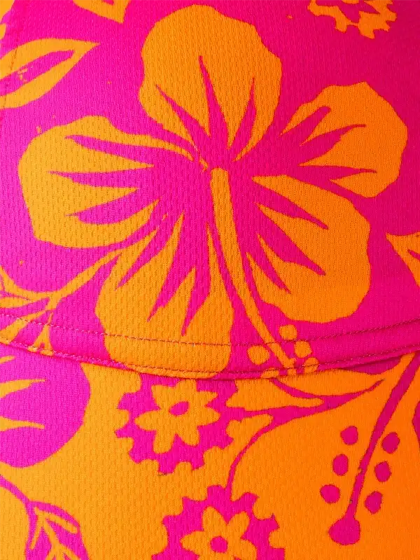 Neon pink and orange cycling cap with floral pattern