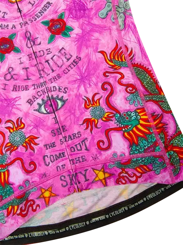 Pink cycling jersey with dragon, roses, and 'I ride' text, featuring bold graphic design for women's or men's cycling wear