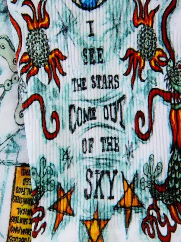 Cycling jersey with 'I see the stars come out of the sky' graphic, flame and star design