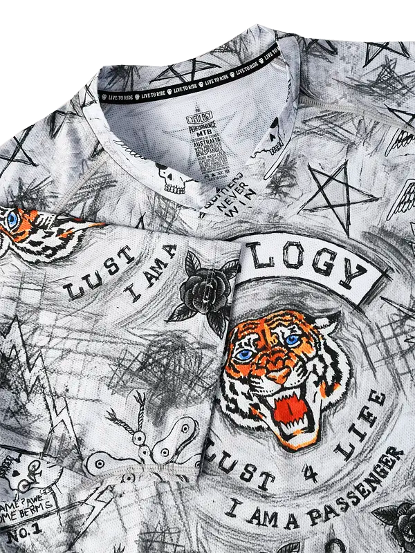 Close-up of a MTB V Neck shirt with tiger design and text on a white background