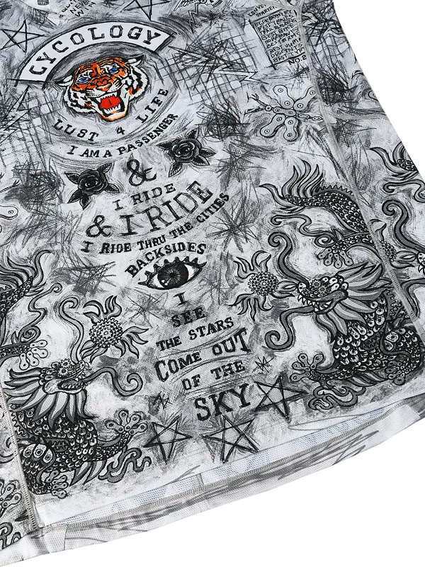 Close up of tattoo art City of Angels Grey Long Sleeve Mountain Bike Jersey | Cycology with black and white designs, text, and symbols.
