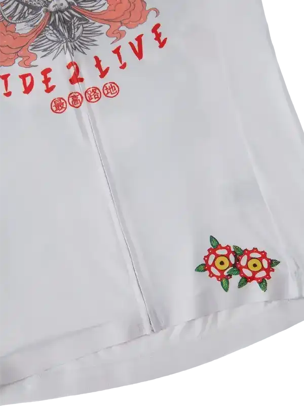 White cycling jersey with 'RIDE 2 LIVE' graphic and red flower embroidery, featuring unique design details.