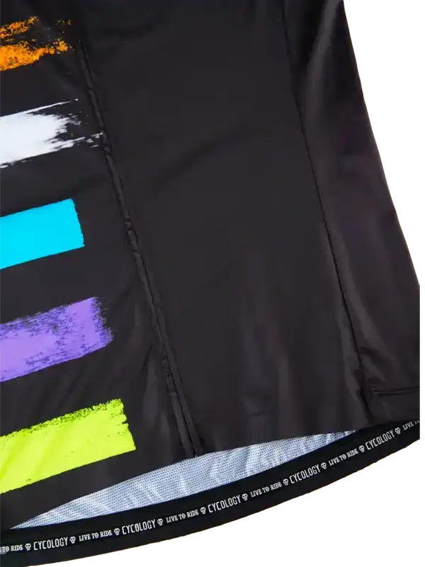 Black cycling shorts with vibrant color block design and reflective hem detail for men's and women's rides