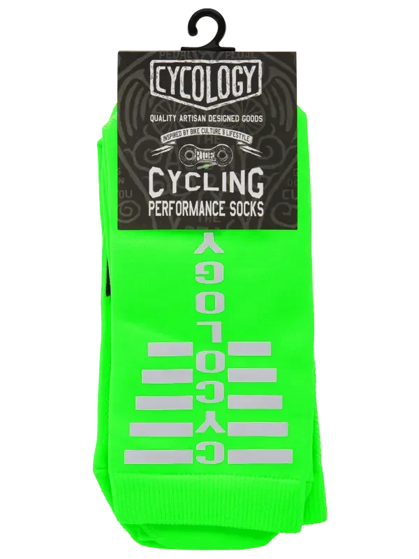 Bright green cycling performance socks with reflective branding, ideal for bike rides and active lifestyles.