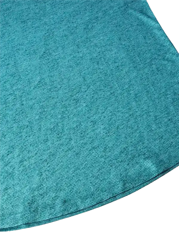 Teal cycling jersey fabric close-up, showcasing breathable texture for men's and women's cycling wear