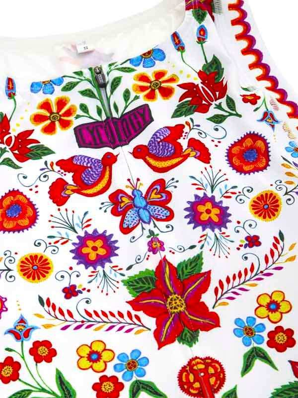 Vibrant floral and bird print cycling jersey with colorful embroidery details