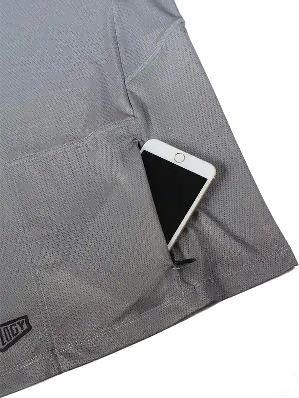 Grey cycling jersey pocket holding smartphone, breathable fabric, secure storage for rides