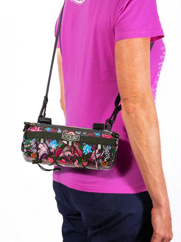 Person Wearing Cycology Handlebar Bag – Compact, Stylish, Water-Repellent Bike Bag