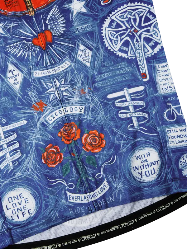Close-up of a blue and white patterned fabric with text and roses, featuring Cyclology branding.