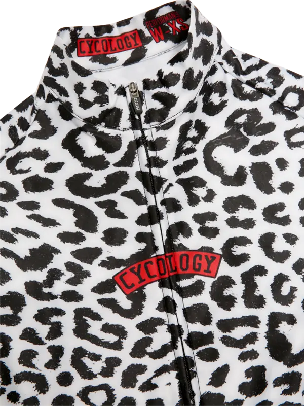 Leopard print cycling jersey with visible  Cycology branding on a white background