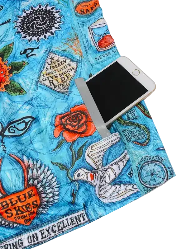 Blue cycling jersey with floral, bird, and motivational print design, featuring phone pocket