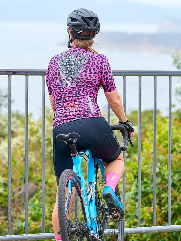 Kitty Pink Women's Cycling Jersey on model back | Cycology UK