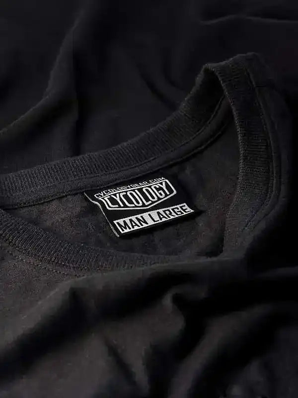 Black men's cycling t-shirt with Cycology brand tag, size large, soft fabric detail