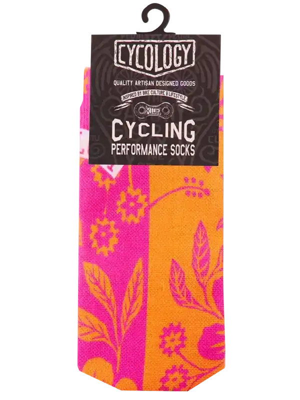 Vibrant pink and orange floral cycling performance socks with artisan design, ideal for bike culture enthusiasts.