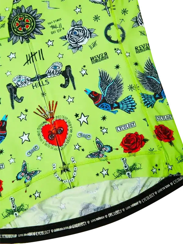 Vibrant neon green cycling jersey with tattoo-style graphics, roses, birds, and stars for men's and women's rides