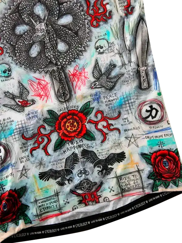 Cycling jersey with bold tattoo-style design, roses, skulls, and motivational phrases for riders.