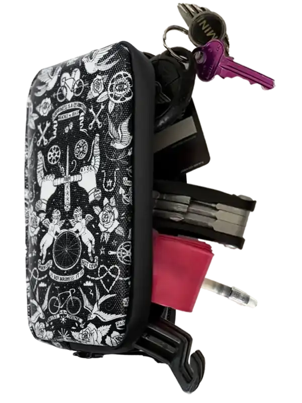 Black and white tattoo-style cycling accessory pouch with keys and tools, ideal for bike riders