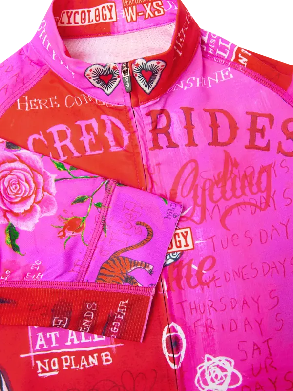 Pink and red cycling jersey with text and graphics