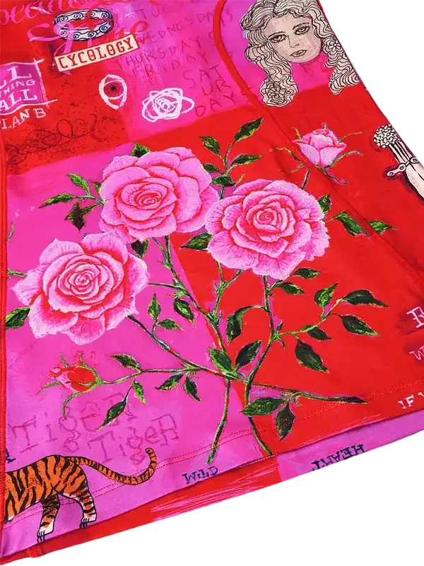 Vibrant pink rose print cycling jersey with tiger and graphic details, stylish women's bike wear