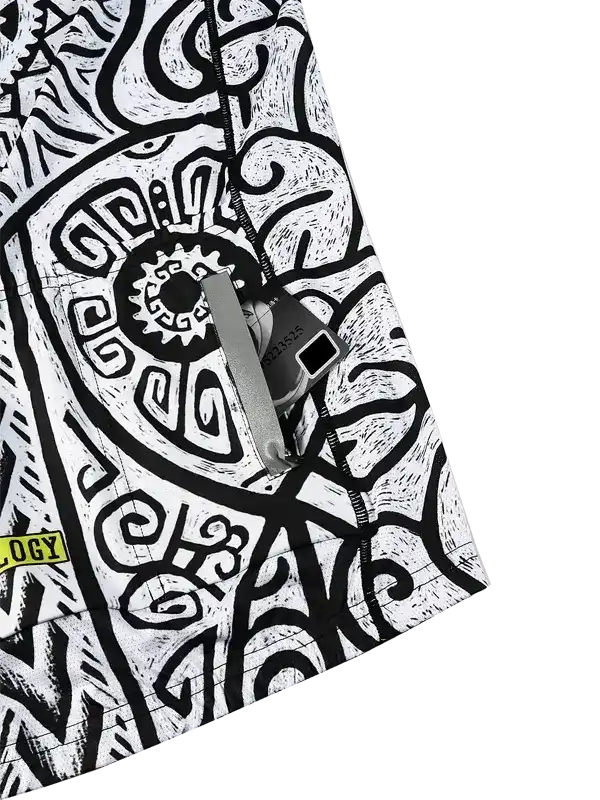 Black and white abstract patterned cycling shorts with zipper pocket and brand tag