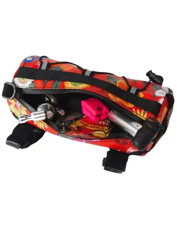 Floral patterned cycling frame bag with tools and snacks inside, ideal for bike rides