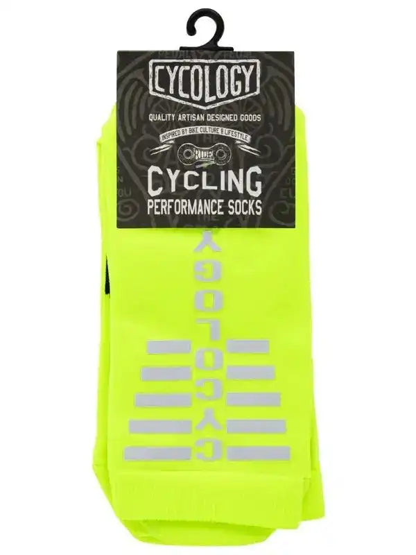Bright neon yellow cycling performance socks with reflective 'CYCOLOGY' branding, ideal for men's and women's bike rides.