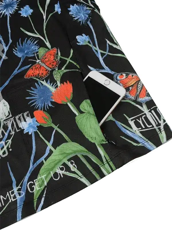 Black cycling shorts with floral and butterfly print, phone in side pocket, stylish bike wear