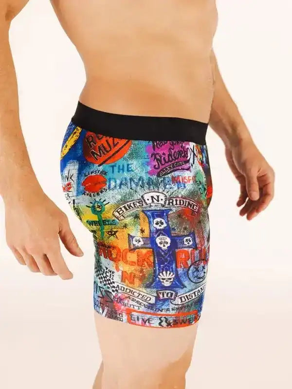 Men's cycling shorts with bold graffiti-style print, featuring skulls and rock-themed graphics for active riders.