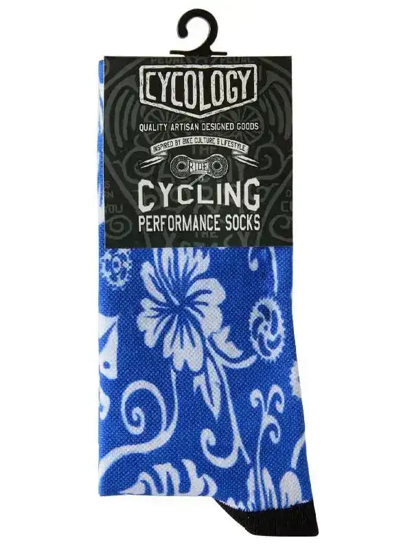 Blue floral cycling performance socks with white pattern, artisan designed for bike culture