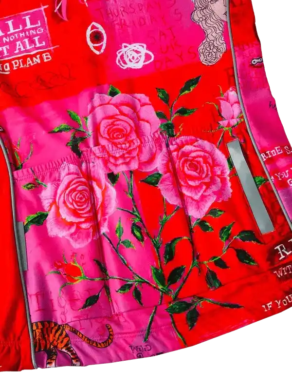 Vibrant red cycling jersey with pink rose print, green leaves, and bold graphic text for women's bike wear