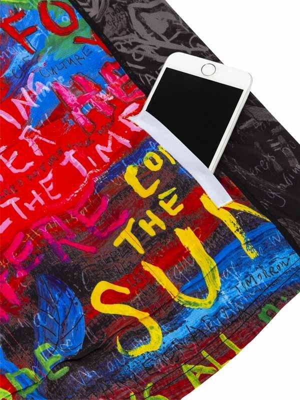 Colorful cycling jersey with bold graffiti-style text and phone pocket, ideal for urban rides