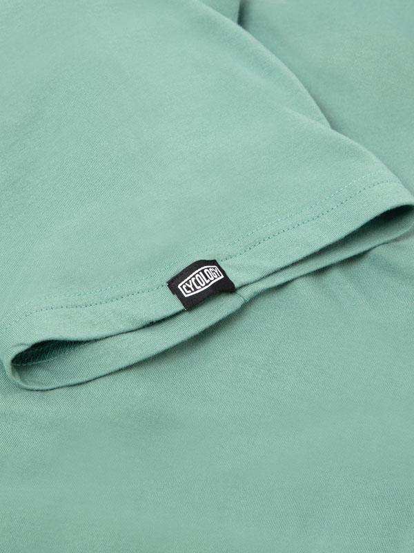 Mint green cycling t-shirt with black CYCOLOGY tag, soft fabric detail for men's and women's ride wear