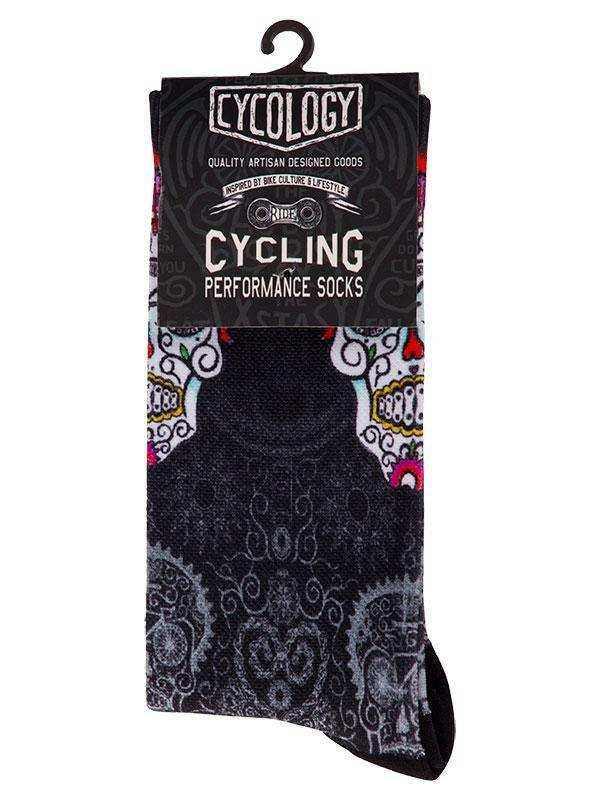 Cycling performance socks with sugar skull design, artisan crafted for bike culture