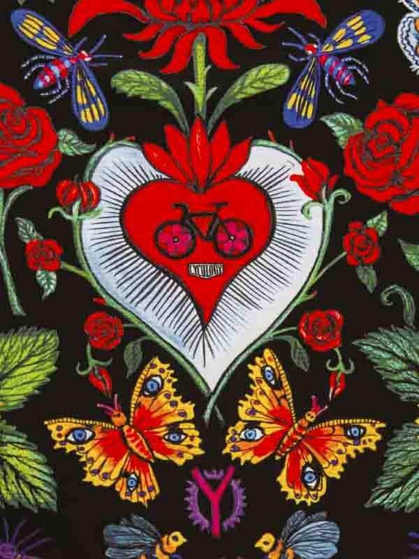Vibrant cycling-themed print with heart, bike, roses, and butterflies on dark background