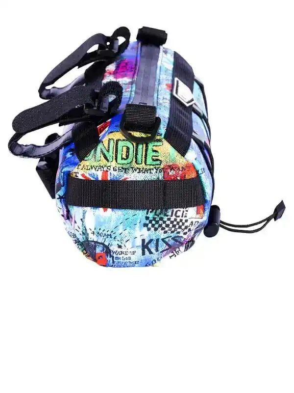 Colorful graffiti-style cycling saddle bag with bold text and black straps for bike storage