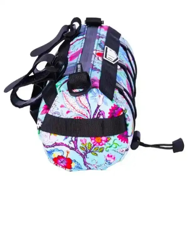 Colorful floral cycling saddle bag with black straps and drawstring closure
