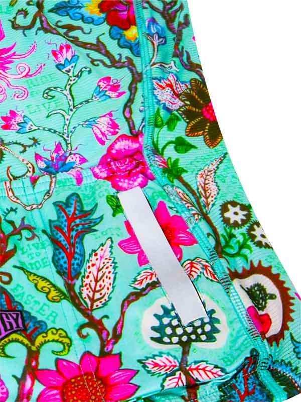 Vibrant floral cycling shorts with reflective strip, ideal for women's bike wear