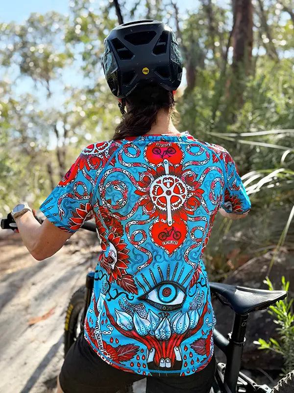 Baja Blue Women's Short Sleeve Mountain Bike Jersey on model back view  | Cycology UK