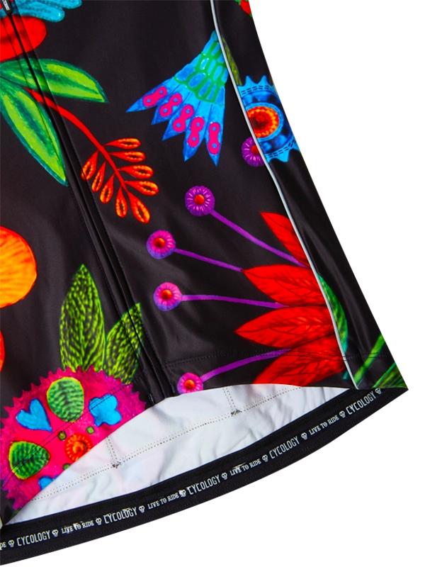 Colorful floral-patterned long sleeve cycling jersey on a black background