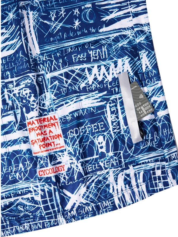 Blue and white patterned cycling jersey with back pockets visible Cycology branding