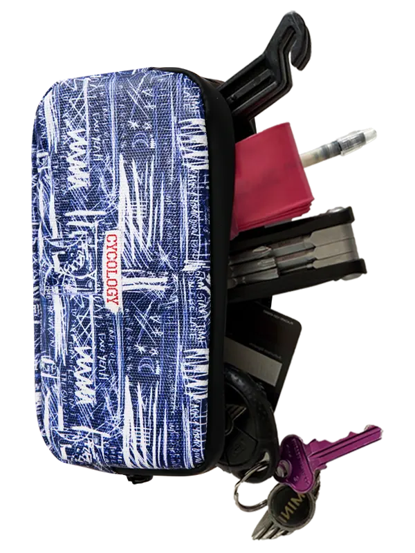 A zippered Cycling Wallet featuring a blue and white abstract graffiti-style pattern with text elements, shown against a plain white background.