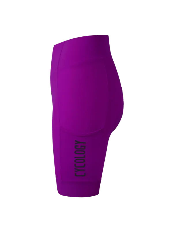 Purple high-waisted cycling shorts with a padded seat and a vertical black 'CYCOLGY' logo on the lower left leg, shown against a plain white background.
