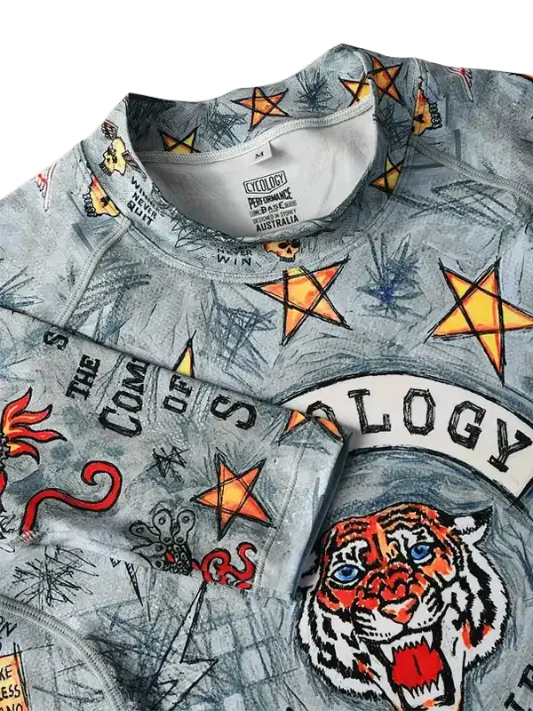 Men's cycling jersey with tiger graphic, stars, and bold print on performance fabric