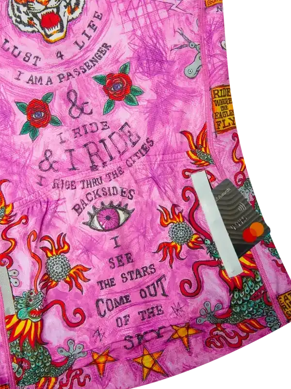 Pink cycling jersey with dragon, roses, and bold text designs for men and women riders