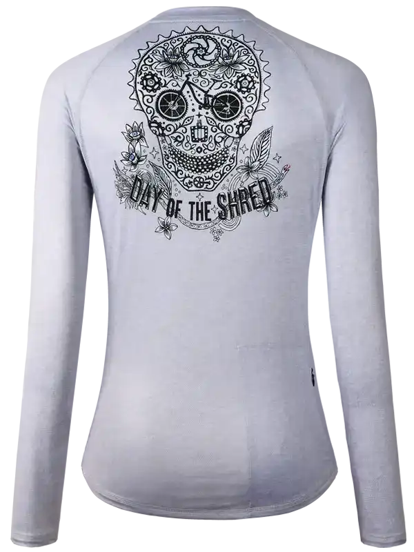 Women's cycling jersey with sugar skull and 'Day of the Shred' graphic, long sleeve, light grey