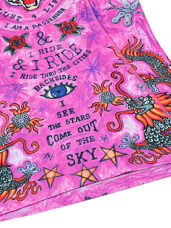 Pink fabric with dragon designs and text