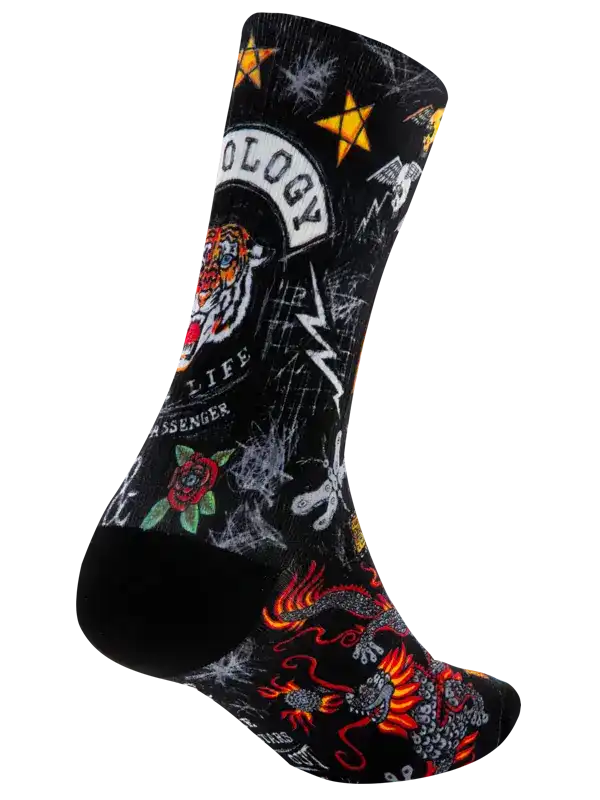 Black cycling sock with bold tiger, dragon, rose, and star tattoo-style graphics for men and women