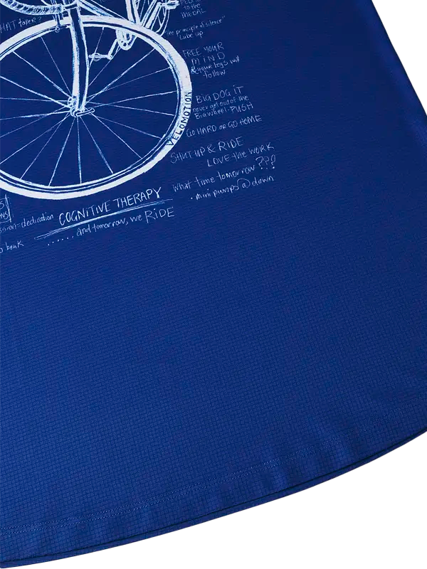 Navy blue fabric with white bicycle design and text 
