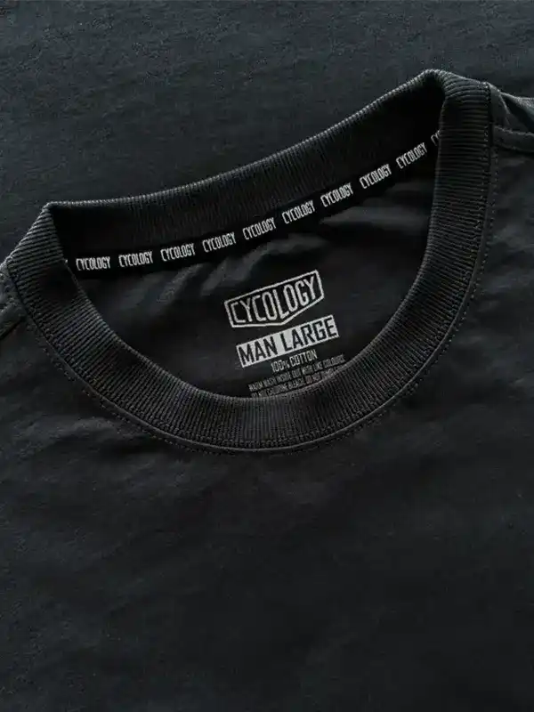 Black men's cycling t-shirt with 'Cycology' tag, 100% cotton, size large, ribbed neckline detail