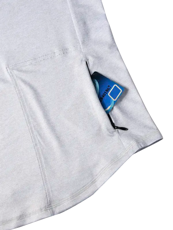 Close-up of a light grey MTB shirt with a zip rear pocket